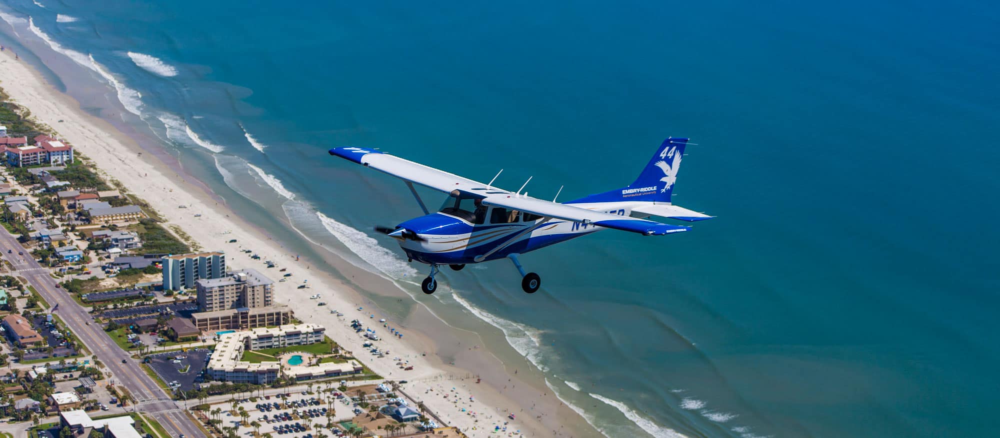 Cessna flying over Daytona Beach