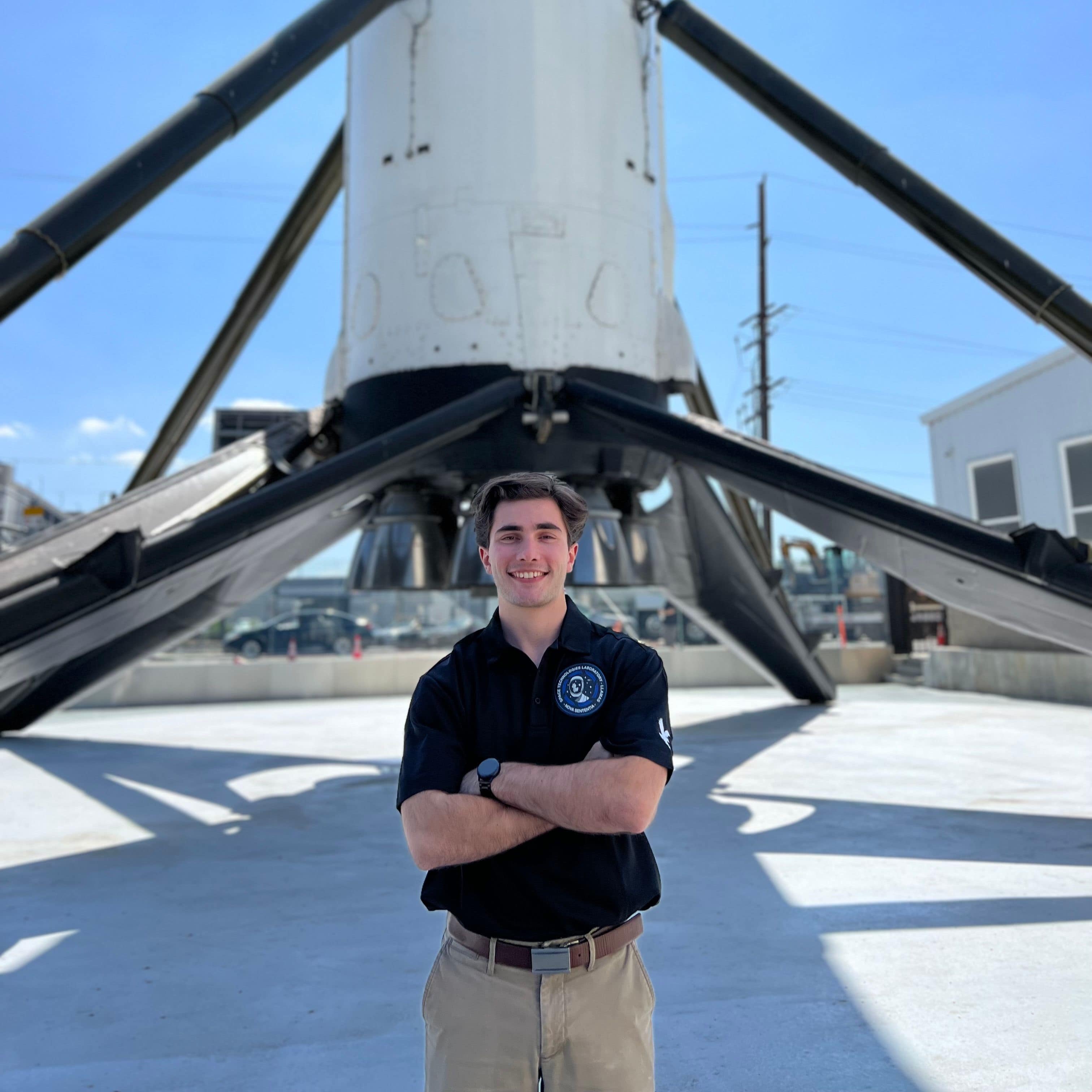 Student Jarred Jordan ('23) standing in front of a SpaceX rocket. (Photo: Jarred Jordan)