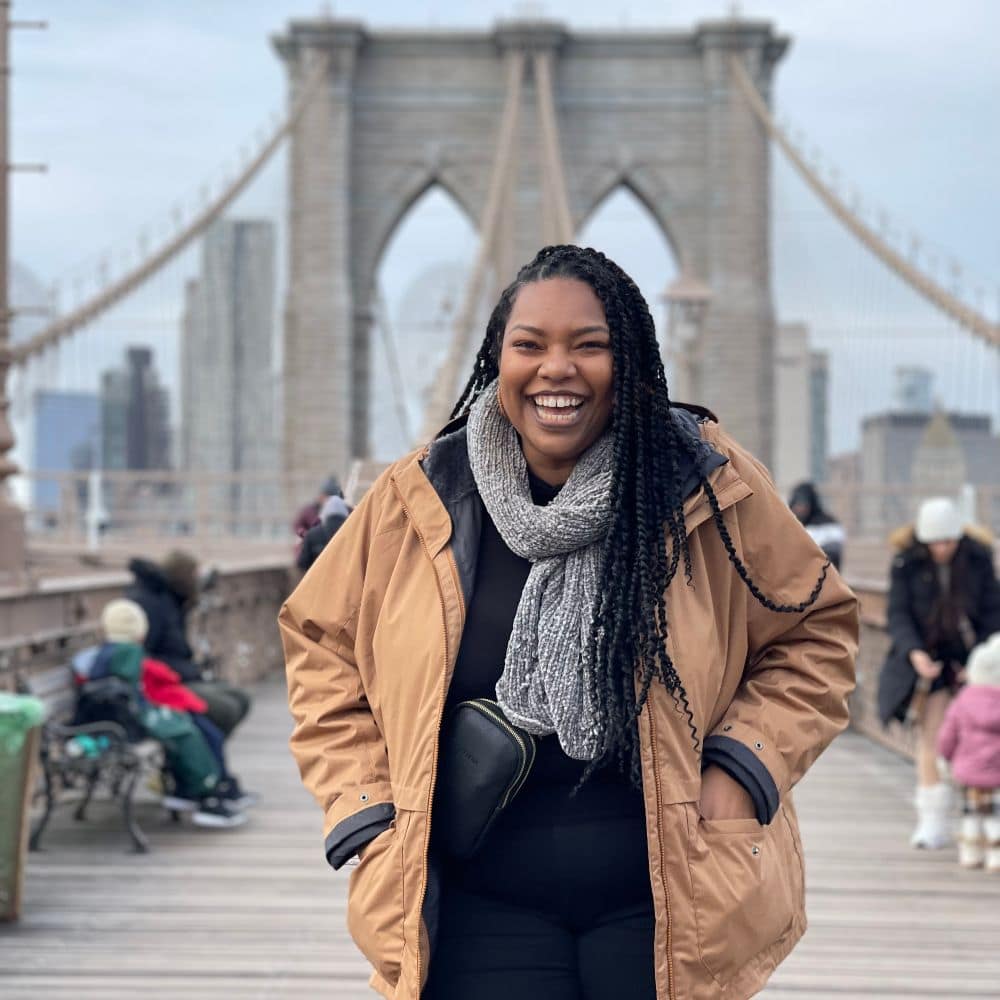 May Maryzana Maginde, shown here bundled up on the Brooklyn Bridge, is all smiles as she reflects on the start of her aviation career. (Photo: May Maryzana)