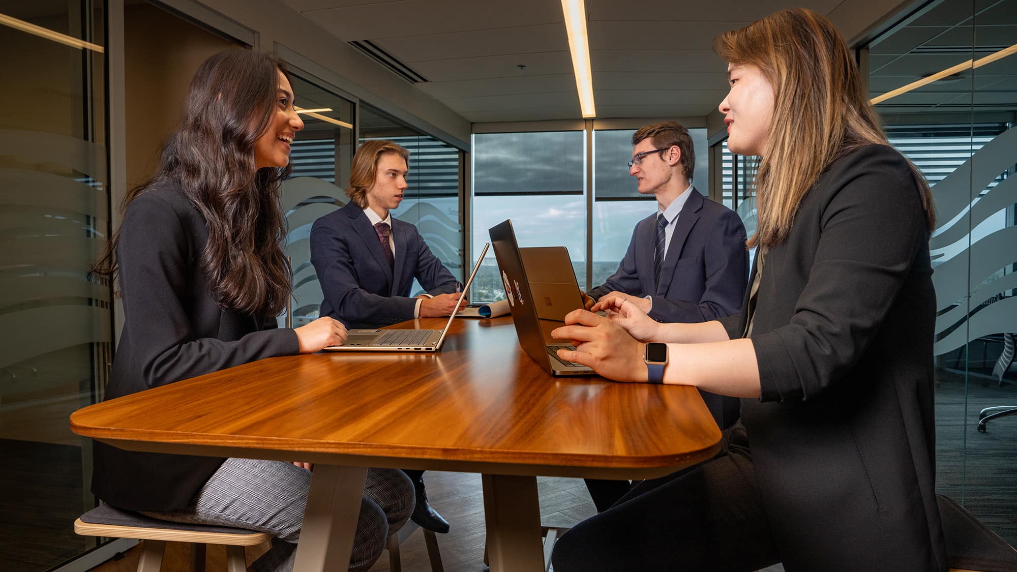 Images of Embry riddle business students in various locations at the Brown and Brown building
