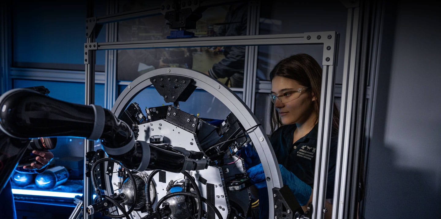 Embry-Riddle student works on a piece of equipment in the engineering lab