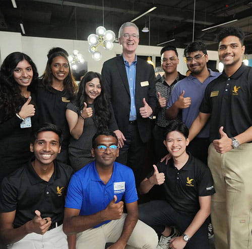 Asia Campus students pose for a photo