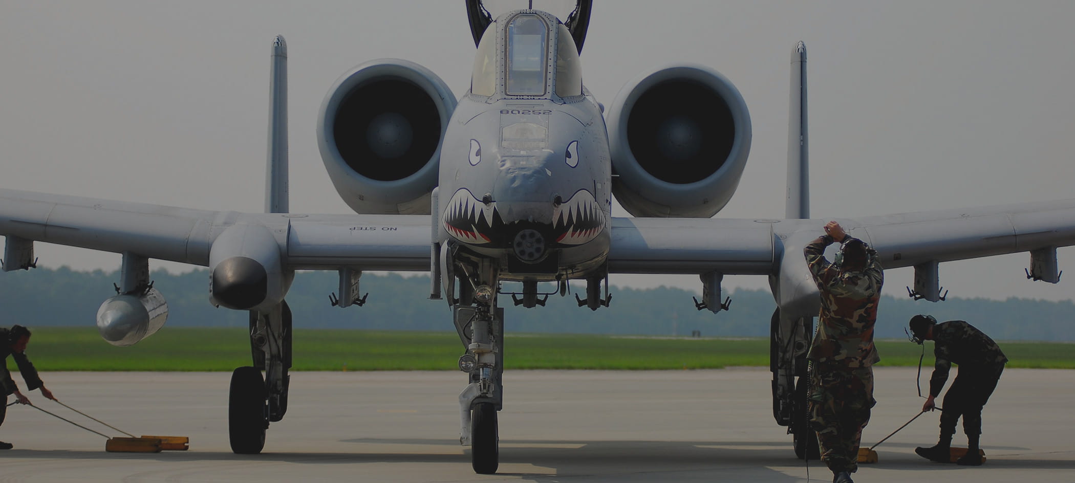 Military jet on runway.