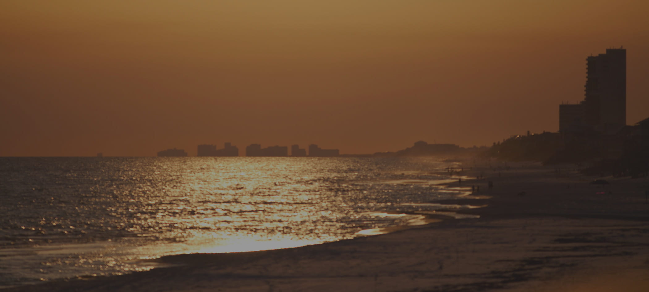 An ocean at sunset.