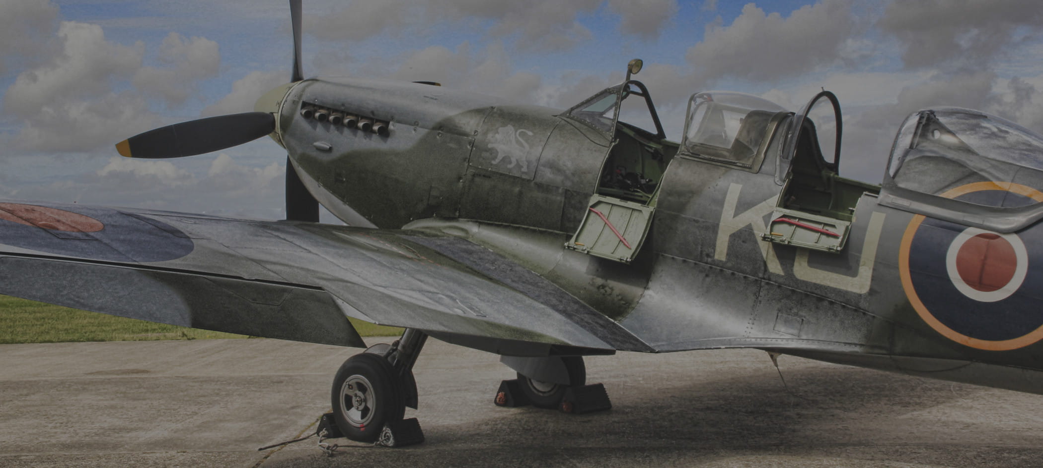 Old plane on runway.