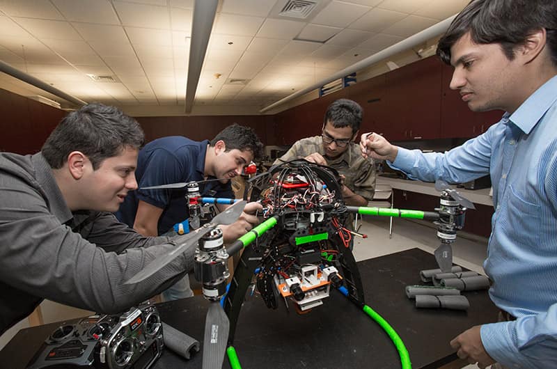 Students work on a quadcopter.