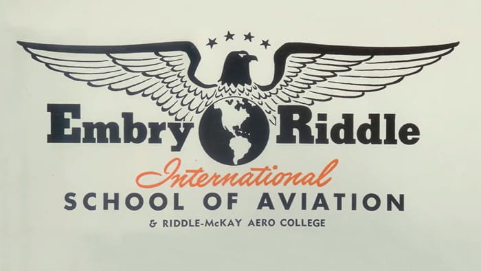Embry-Riddle International School of Aviation logo from 1930s to early 1940s with spread-wing eagle above text and five stars overhead.