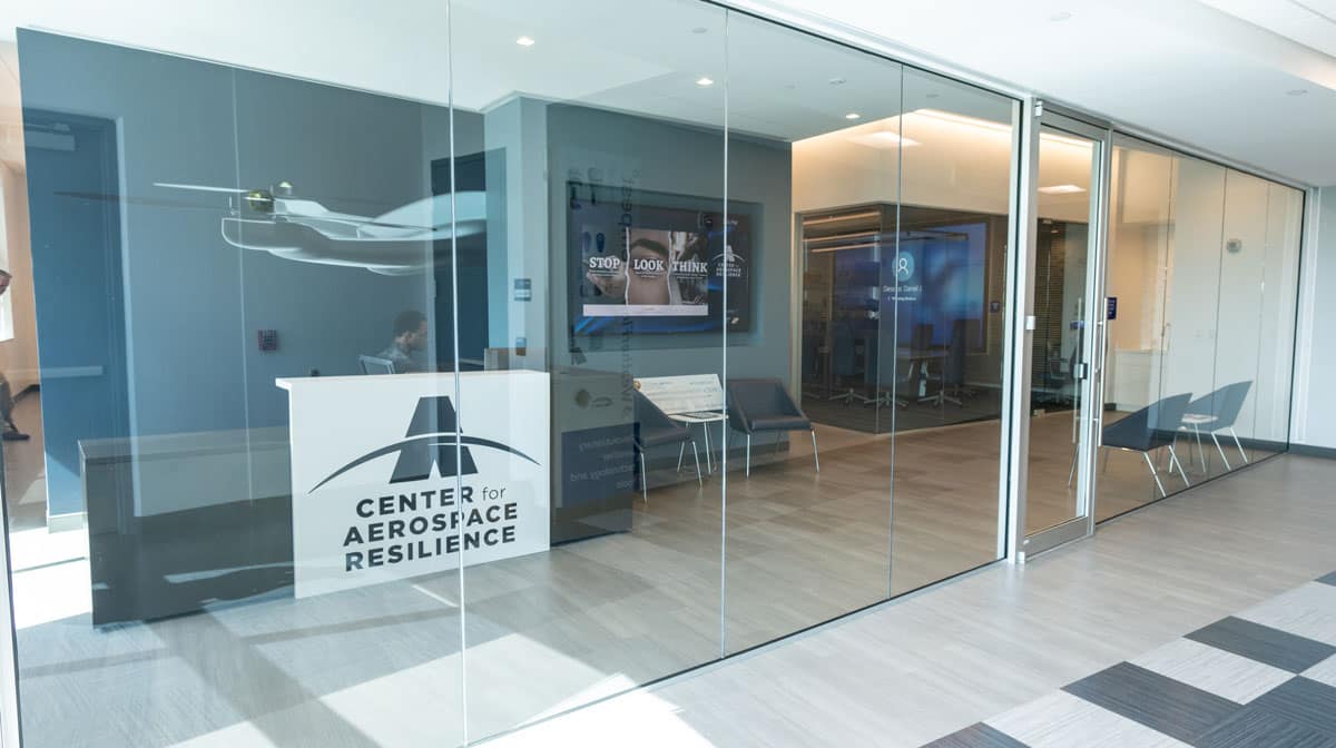 Glass door entrance to the Center for Aerospace Resilient Systems (CARS)
