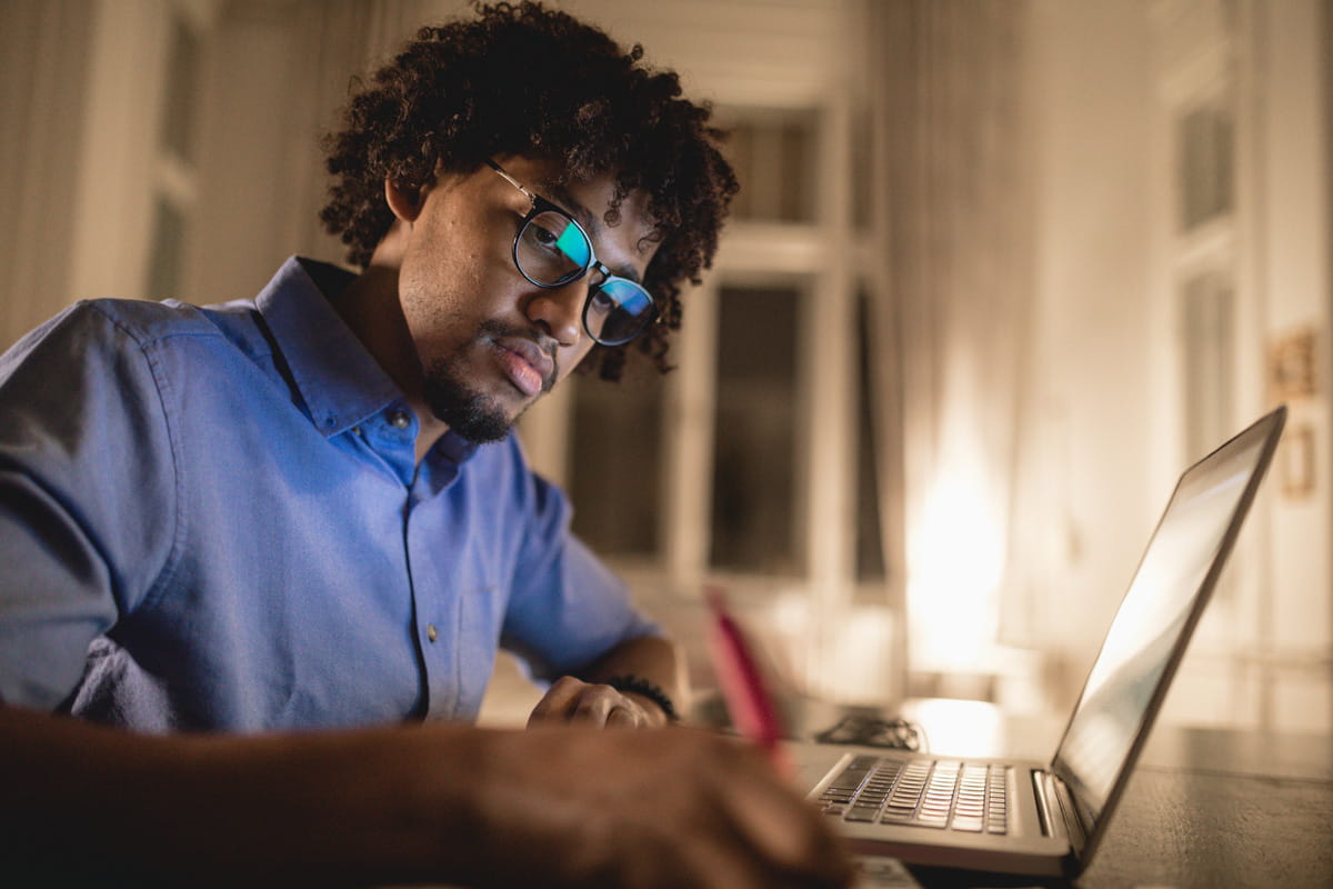 Man working on a laptop.