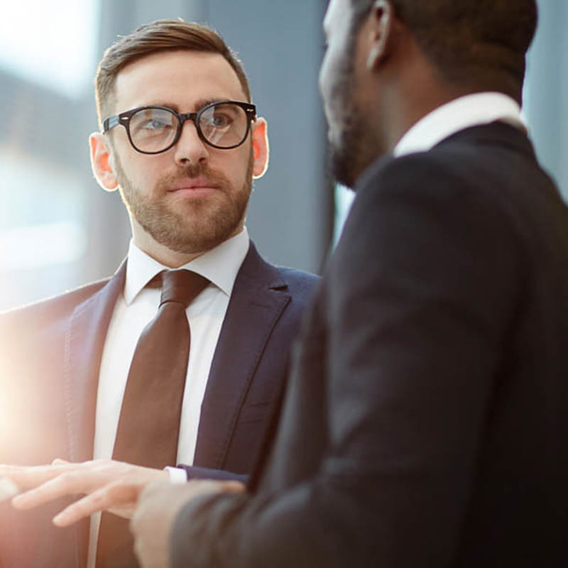 Two businessmen in suits