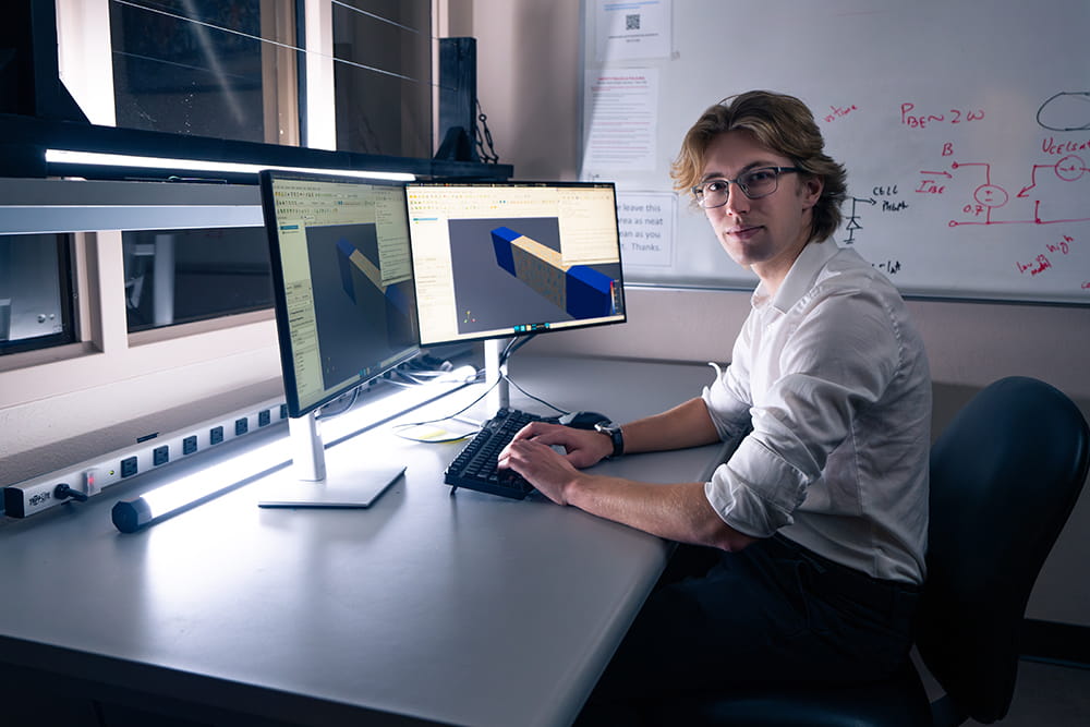 Embry-Riddle student sits at a computer in a math lab