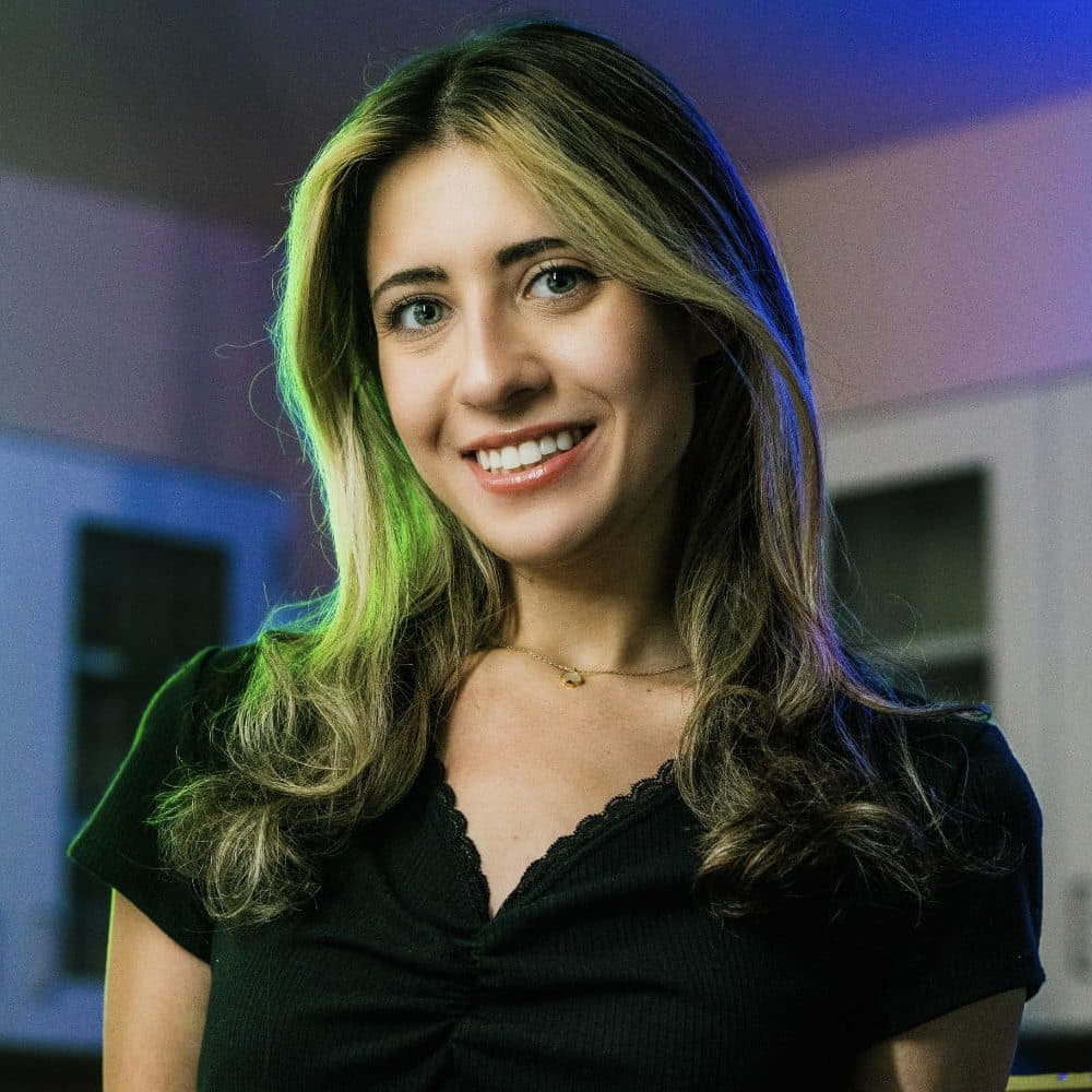 Dori Stein stands in a lab on the Daytona Beach Campus and poses for a photo