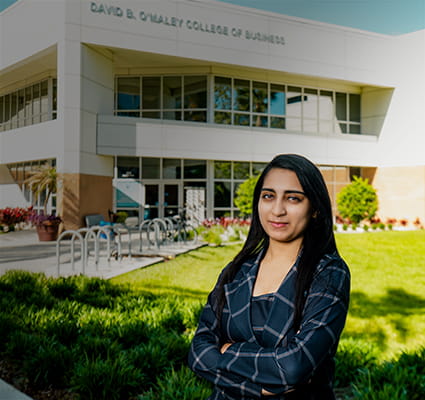 Embry-Riddle student stands outside the Daytona Beach College of Business