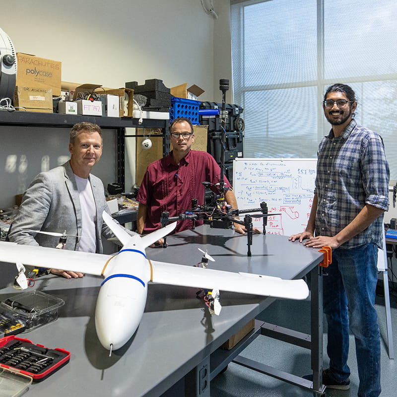 Embry-Riddle students work on an uncrewed vehicle in a lab