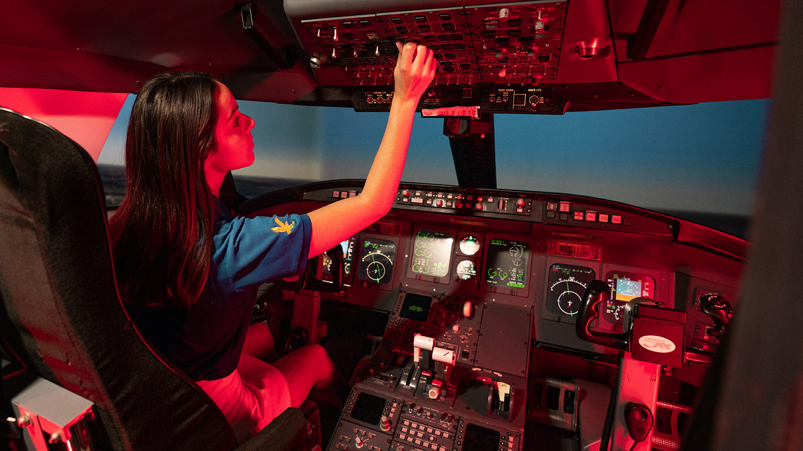 Embry-Riddle student practices in a flight simulator