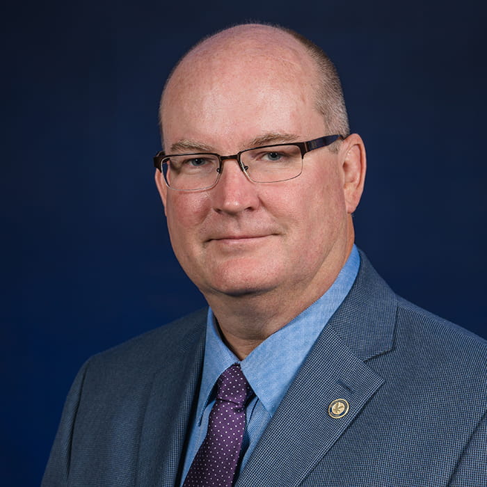 Professional headshot of Alan Stolzer