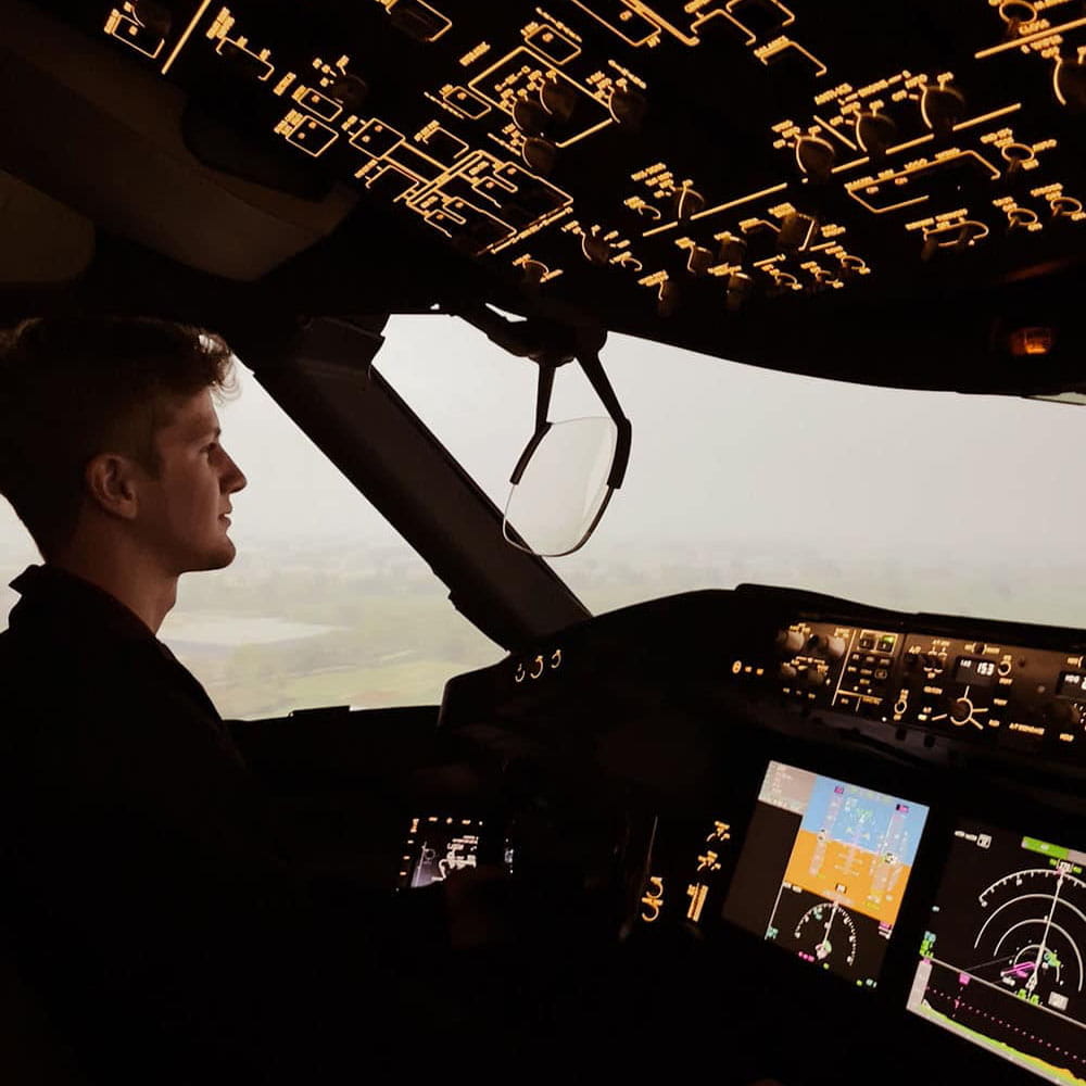 Arthur Clarke flies a 787 Dreamliner simulator that shows foggy conditions