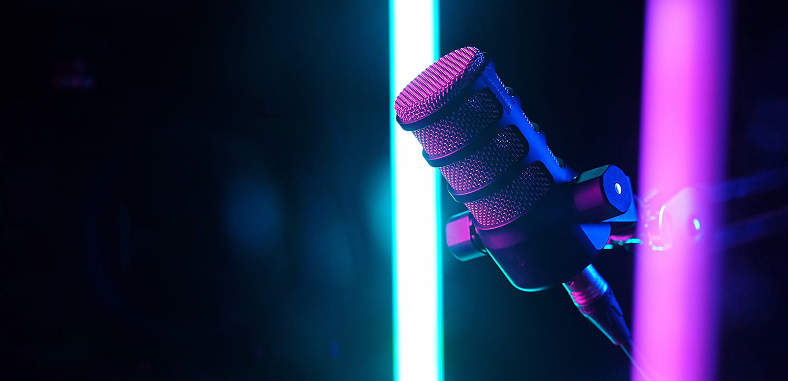 microphone with a blue and magenta light bar