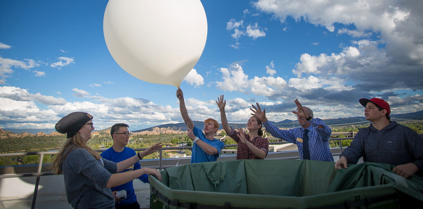 Meteorology students study weather factors outside at Embry-Riddle Aeronautical University in Prescott, Arizona