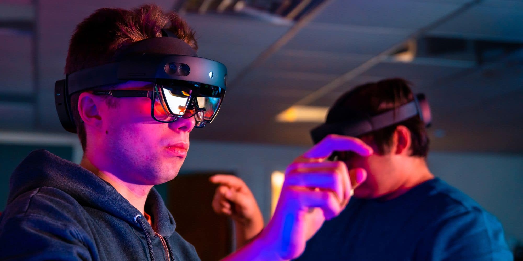 Two Embry-Riddle students wear virtual reality glasses