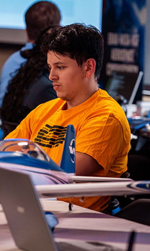 Student at an Aerospace Cybersecurity Workshop