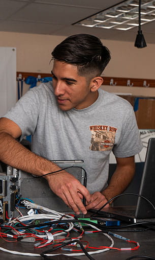 Two students work on a research project