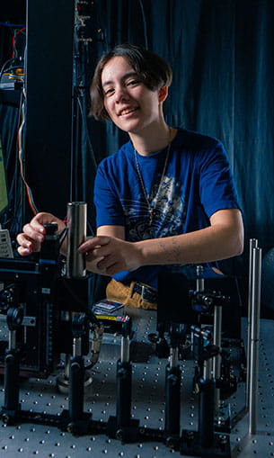 A student works in the LIGO Optics Lab
