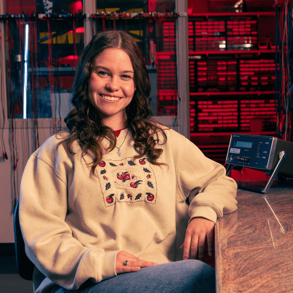 Molly Ruley sits in an engineering lab