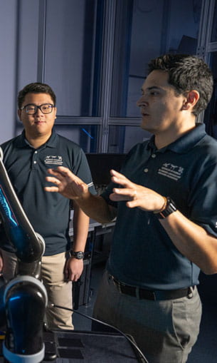 Professor and student in the Advanced Dynamics Lab