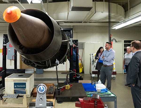 Executives from Pratt & Whitney meet with members of the Embry-Riddle Aeronautical University Society of Aerospace Technicians Club for lunch and a tour of the Aviation Maintenance Science building
