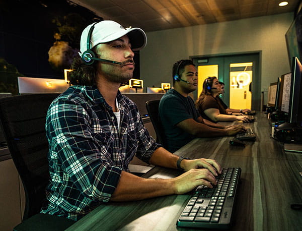 Students working in the mission control lab