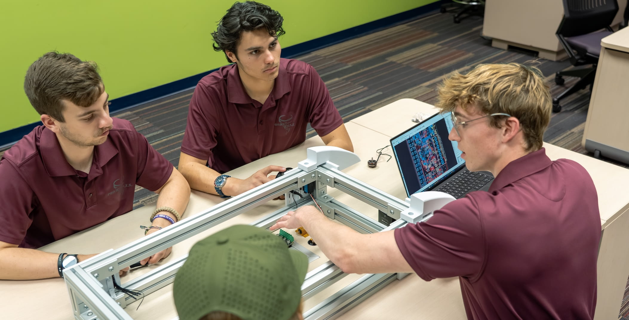 Four students in a lab setting