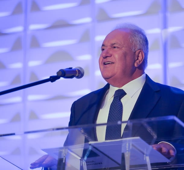 Mori Hosseini speaks at a podium