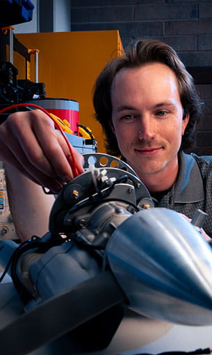 A student working on a propeller
