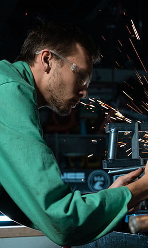 Student building a Formula SAE racecar