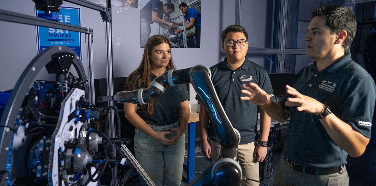 Students and professor in the Advanced Dynamics Lab