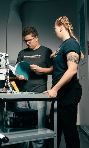 Students working in the avionics lab in AMS.