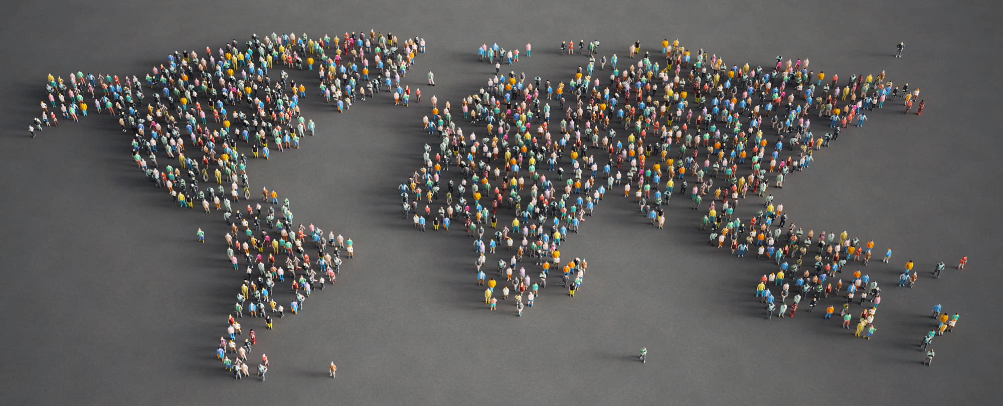 Crowd of people arranged to form a world map across a large open surface, conceptual illustration.