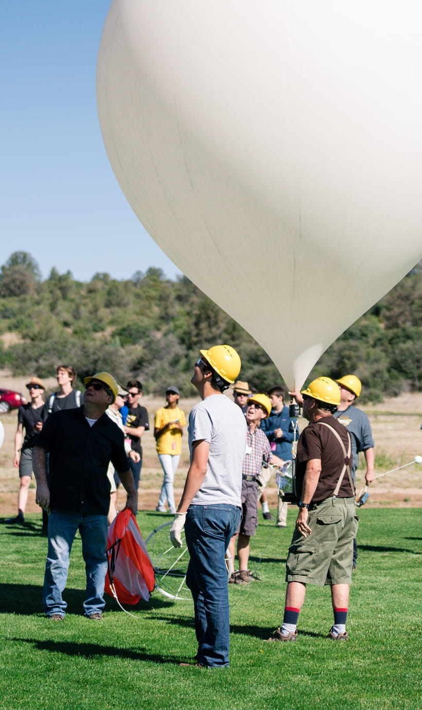 Meteorology students with a weather balloon on the Prescott Campus.