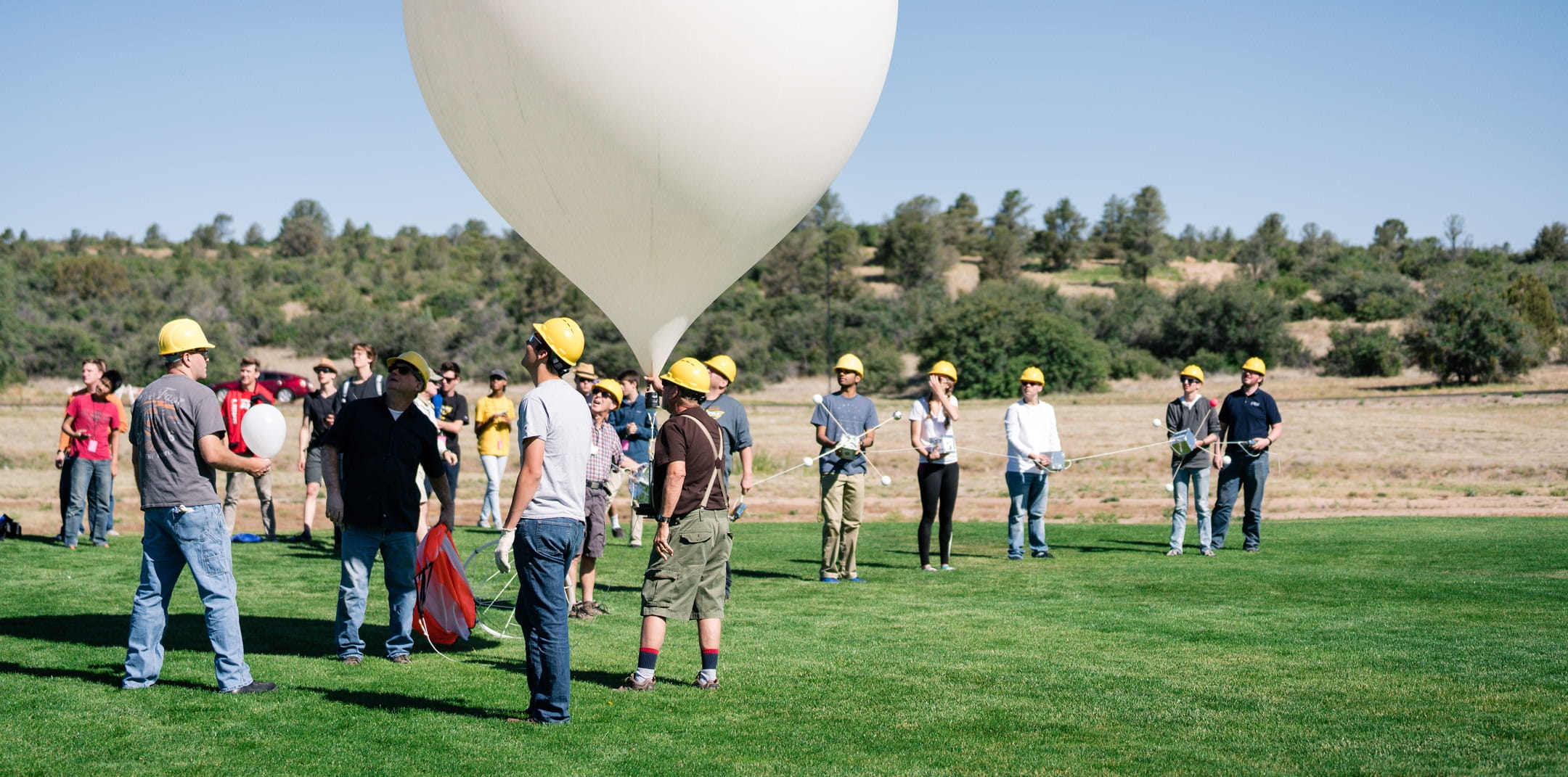 Meteorology students with a weather balloon on the Prescott Campus.