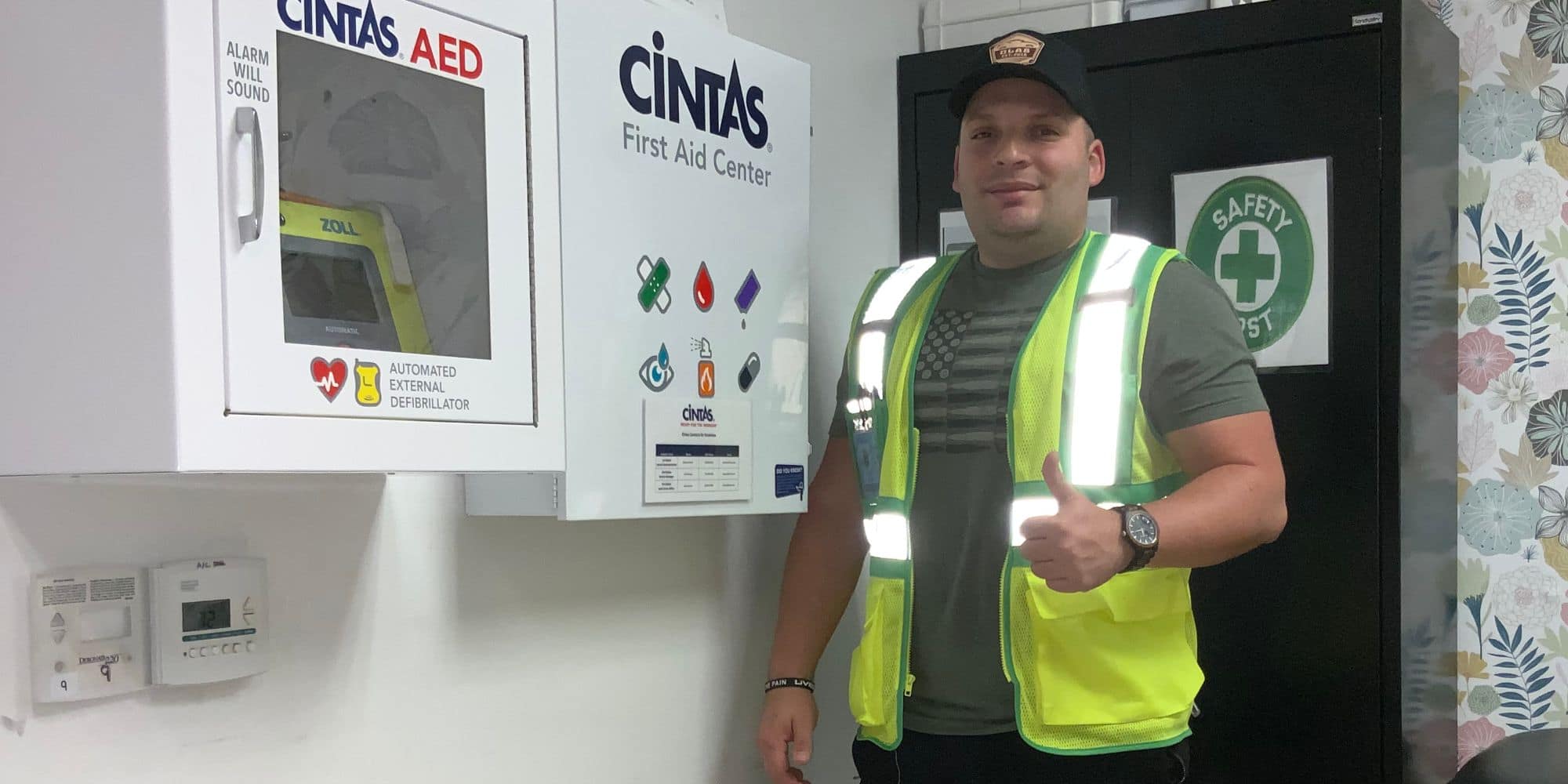 B.S. in Safety Management student Luis Artigas gives a thumbs up after examining workplace safety equipment. (Photo: Luis Artigas)