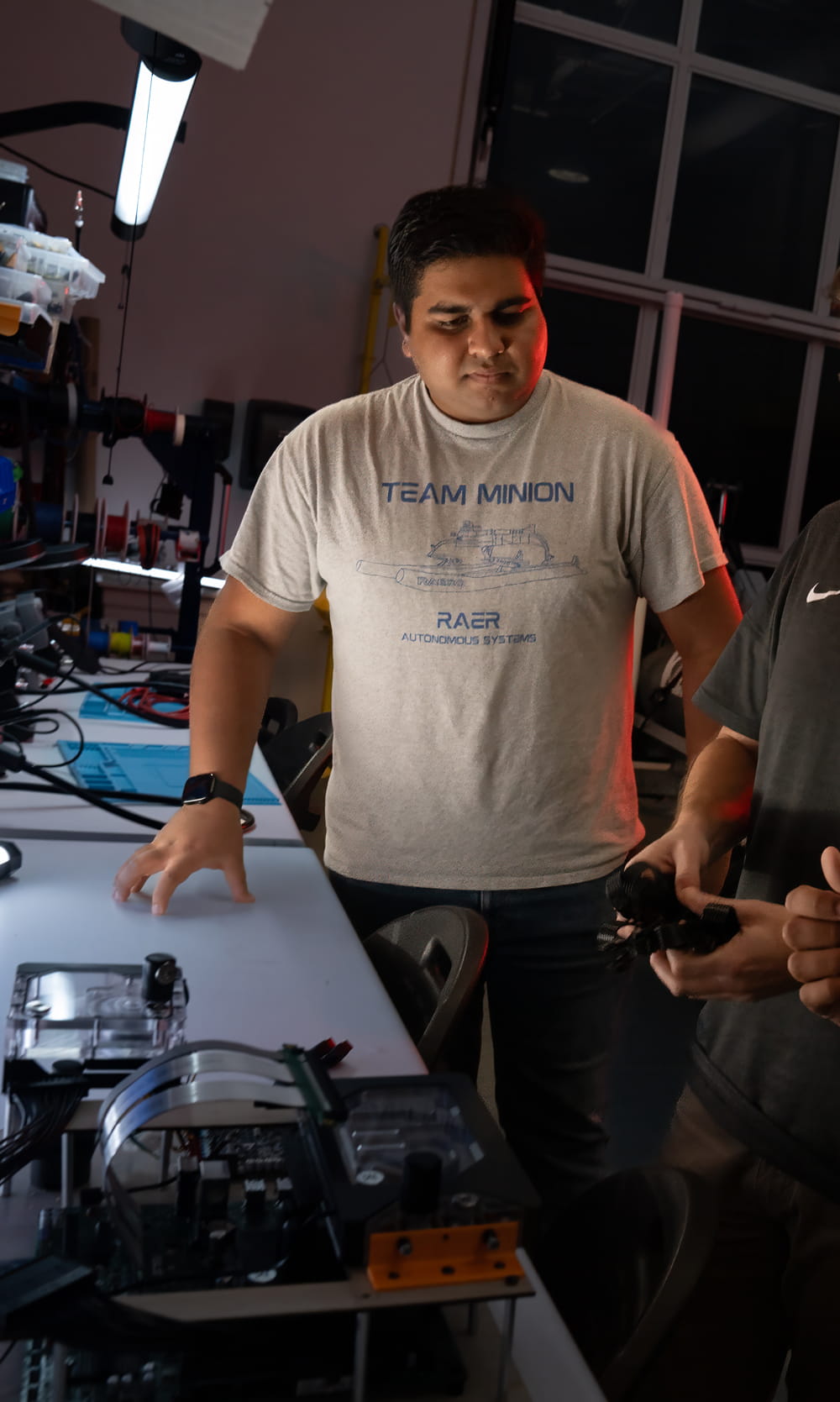 Students work on an autonomous vehicle.