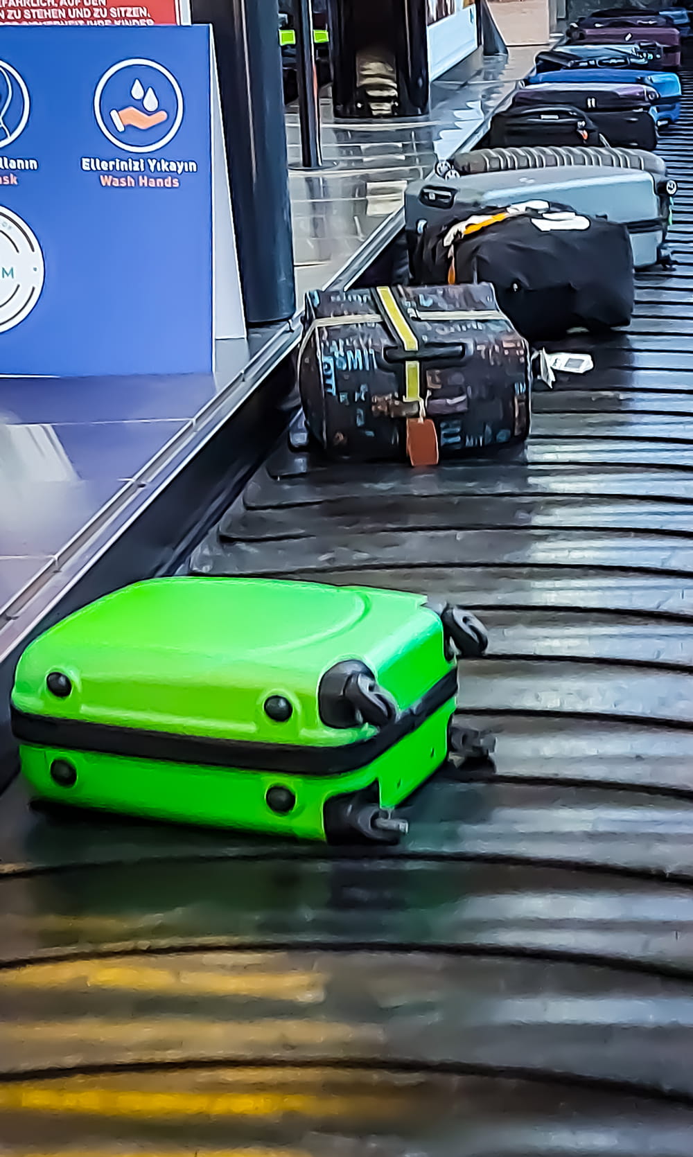 Baggage moves on the conveyor belt.