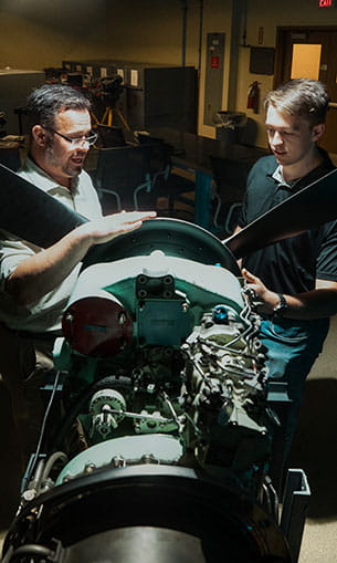 Student with professor in the VR Props Lab
