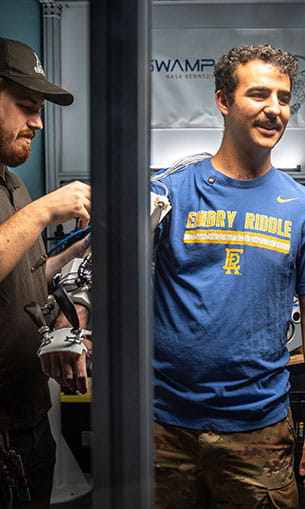 Students working in the Engineering Physics Propulsion Lab