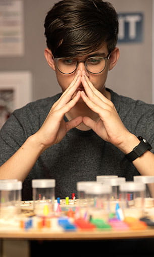 Student working in sim class
