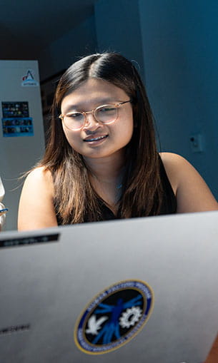 Student in front of a laptop