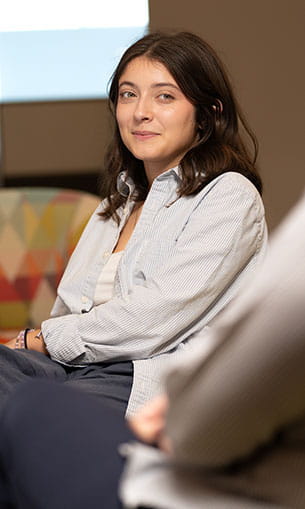 Student sitting in a chair