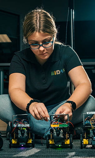Student working on BID4R lab swarm robots