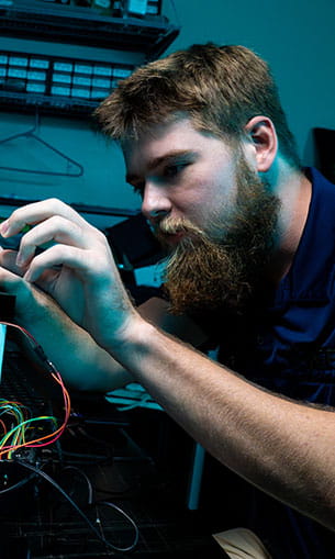 Student working in one of the EECS labs